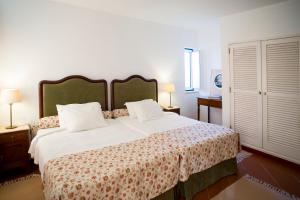 Ein Bett oder Betten in einem Zimmer der Unterkunft Casa do Castelo - Turismo de Habitação