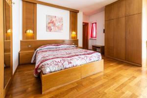 Łóżko lub łóżka w pokoju w obiekcie Albergo Bucaneve
