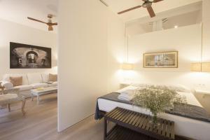เตียงในห้องที่ MAI BY OLDTOWN APARTMENTS