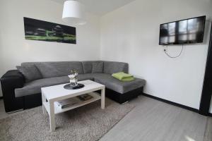 Posezení v ubytování Ferienwohnung Schmidt, 95131