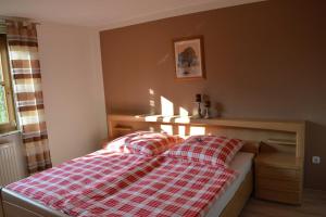 Postel nebo postele na pokoji v ubytování Ferienwohnung Schmidt, 95131