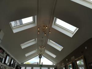 a ceiling with windows and a chandelier in a building at Townsend House Guest House in Birr