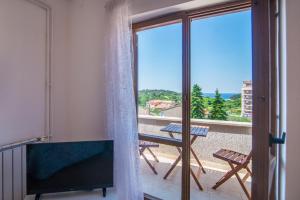 Balkón nebo terasa v ubytování Apartmani Ivan Pula