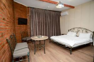 Postel nebo postele na pokoji v ubytování Hotel Ragnar + 21 fotografií