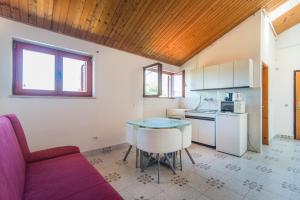 Kuchyň nebo kuchyňský kout v ubytování Apartmani Ivan Pula