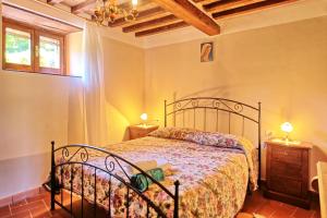 Voodi või voodid majutusasutuse Borgo Veronica by PosarelliVillas toas