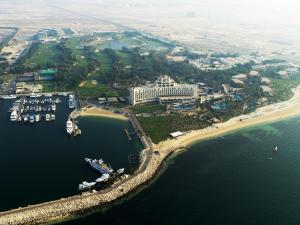 a large body of water with boats docked at JA Lake View Hotel (JA The Resort) in Dubai