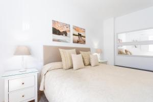 Posteľ alebo postele v izbe v ubytovaní Vivienda vacacional La Laguna Luxe