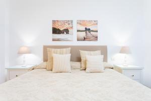 Posteľ alebo postele v izbe v ubytovaní Vivienda vacacional La Laguna Luxe