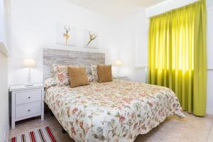Postel nebo postele na pokoji v ubytování Vivienda Vacacional La Laguna Deluxe 6