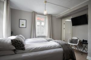Postel nebo postele na pokoji v ubytování Reykjavik Residence Apartment Hotel