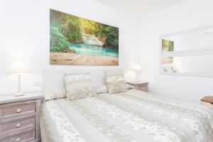 Postel nebo postele na pokoji v ubytování Vivienda vacacional La Laguna Deluxe 9