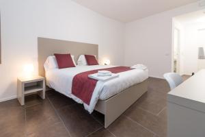 Voodi või voodid majutusasutuse Hotel Cascina Fossata & Residence toas
