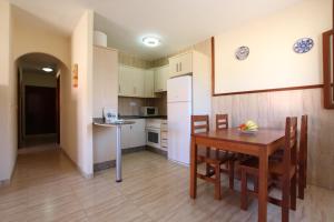 Kuchyň nebo kuchyňský kout v ubytování Apartamentos Tesy