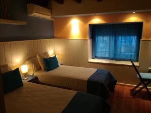 Postel nebo postele na pokoji v ubytování Hospedium Aloque Posada Hotel Rural