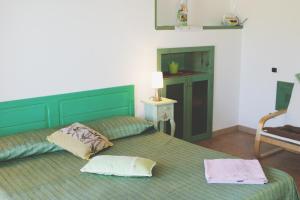 Postel nebo postele na pokoji v ubytování B&B S'ARROSA ANTIGA