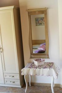 Postel nebo postele na pokoji v ubytování B&B S'ARROSA ANTIGA