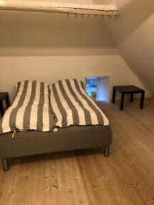 Postel nebo postele na pokoji v ubytování Agerfeld gl. skole