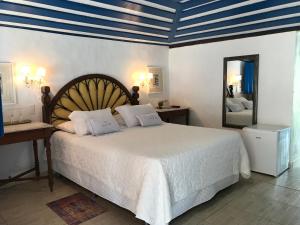 Postel nebo postele na pokoji v ubytování Casa Amor do Mar