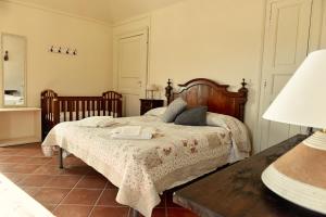 Un pat sau paturi într-o cameră la Agriturismo La Fucina