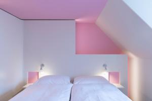 Voodi või voodid majutusasutuse Hotel Dom - das Hotel mit dem Integrationskonzept toas