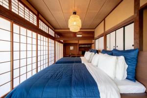 Postel nebo postele na pokoji v ubytování Oyado Ryu / Vacation STAY 54218