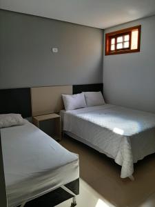 Cama o camas de una habitación en Pousada Viva Maragogi
