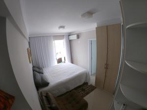Cama o camas de una habitación en Cobertura apartamento