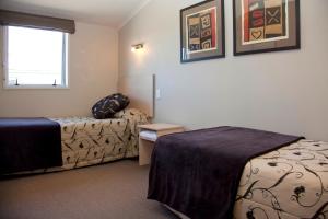 Ένα ή περισσότερα κρεβάτια σε δωμάτιο στο Beechtree Motel