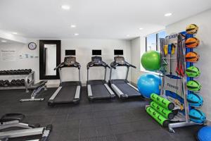 a gym with several treadmills and exercise bikes at Holiday Inn Express Exton - Great Valley by IHG in Exton