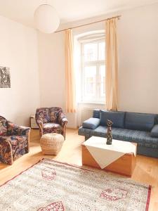 Een zitgedeelte bij Pension Huber - Apartement Wien 9