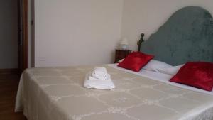 A bed or beds in a room at Casa del Bernini