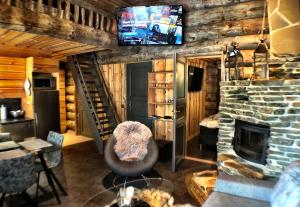 Телевизор и/или развлекательный центр в Ruka Chalet Plage Oliver