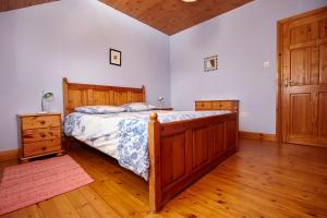 Katil atau katil-katil dalam bilik di Mount Brandon Cottages Graiguenamanagh