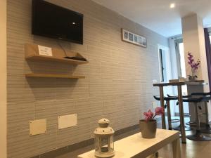 TV a/nebo společenská místnost v ubytování Sweet Apartment Las Canteras