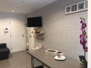 TV a/nebo společenská místnost v ubytování Sweet Apartment Las Canteras