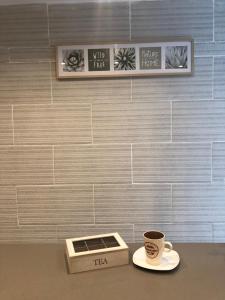 Příslušenství pro přípravu čaje a kávy v ubytování Sweet Apartment Las Canteras