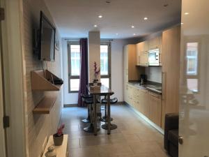 Kuchyň nebo kuchyňský kout v ubytování Sweet Apartment Las Canteras