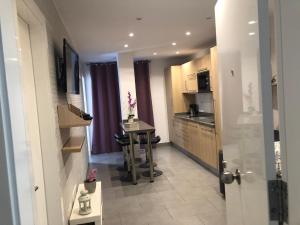 Kuchyň nebo kuchyňský kout v ubytování Sweet Apartment Las Canteras
