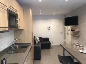 Kuchyň nebo kuchyňský kout v ubytování Sweet Apartment Las Canteras