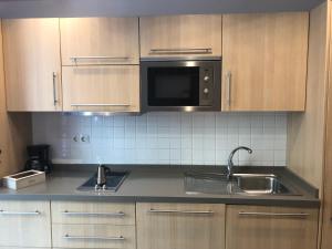 Kuchyň nebo kuchyňský kout v ubytování Sweet Apartment Las Canteras