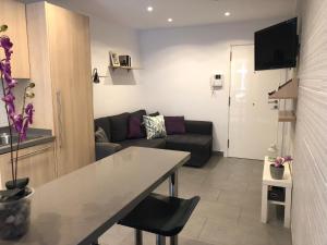 TV a/nebo společenská místnost v ubytování Sweet Apartment Las Canteras