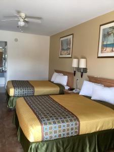 Postel nebo postele na pokoji v ubytování Texas Inn - Welasco/Mercedes