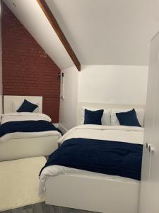 Letto o letti in una camera di Rahman Hostel