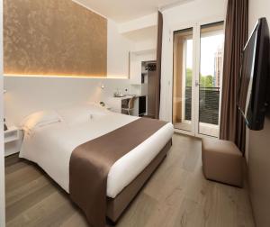Postel nebo postele na pokoji v ubytování Best Western Hotel Biri