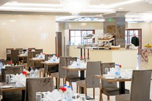 Reštaurácia alebo iné gastronomické zariadenie v ubytovaní Bosphorus Hotel Medina