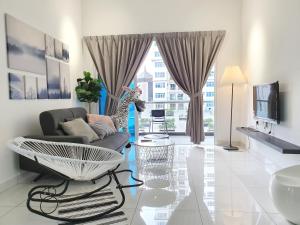 a living room with a zebra head on a couch at No.7 The Zebra @ Puchong Skypod Residence in Puchong