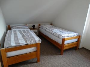 Posteľ alebo postele v izbe v ubytovaní Ubytování u kostela, SEDLO 12os