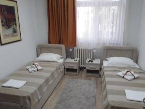 Posteľ alebo postele v izbe v ubytovaní Apartman Karadjordje