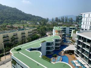 an aerial view of a resort with a swimming pool at Absolute Twin Sands by Lofty in Patong Beach